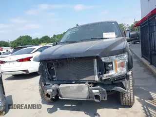 2019 Ford F-150 XL with VIN 1FTEW1CP3KKF31901, listed as a IAAI auction lot 42030790 with 73,771 mi miles and . Bid and sale history available at DreamBid. Image 13.