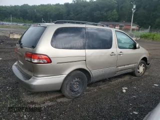 2003 Toyota Sienna LE with VIN 4T3ZF13C33U540296, listed as a Copart auction lot 62643745 with 143,727 mi miles and Salvage title. Bid and sale history available at DreamBid. Image 3.