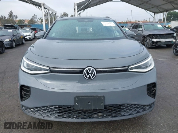 2023 Volkswagen ID.4 S z VIN 1V25MPE80PC051099, wystawiony jako IAAI lot #41332507 z przebiegiem 12 037 mil mil oraz . Historia ofert i sprzedaży dostępna na DreamBid. Obrazek 12.