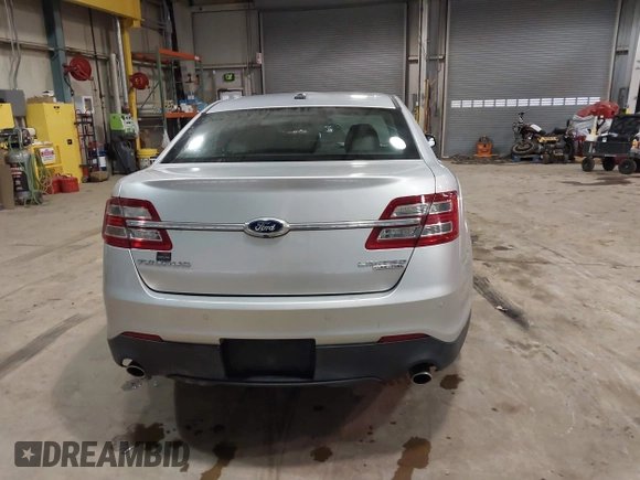 2013 Ford Taurus Limited with VIN 1FAHP2F83DG116657, listed as a IAAI auction lot 41533075 with 124,649 mi miles. Bid and sale history available at carsss.com. Image 16.