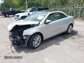 2012 Volkswagen Eos Komfort with VIN WVWBW7AHXCV006075, listed as a IAAI auction lot 42054520 with 104,037 mi miles and . Bid and sale history available at DreamBid. Image 2.