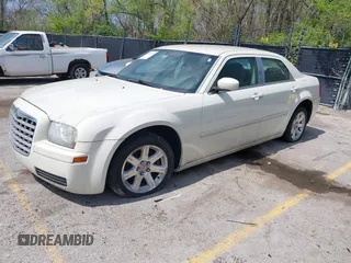 2006 Chrysler 300 with VIN 2C3LA43R16H250237, listed as a IAAI auction lot 42002745 with 157,911 mi miles. Bid and sale history available at carsss.com. Image 2.
