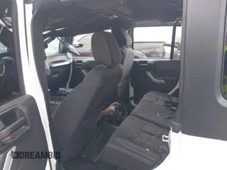 2016 Jeep Wrangler Unlimited Sahara with VIN 1C4BJWEG8GL129577, listed as a IAAI auction lot 42184373 with 185,761 mi miles and . Bid and sale history available at DreamBid. Image 8.