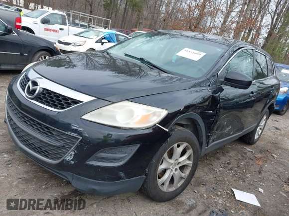 2011 Mazda CX-9 Sport with VIN JM3TB2BA9B0306200, listed as a IAAI auction lot 41511609 with 315,716 mi miles and . Bid and sale history available at DreamBid. Image 2.
