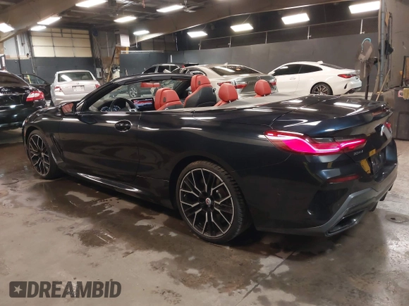 2023 BMW 8 Series with VIN WBAFY4C01PCM52812, listed as a IAAI auction lot 41967777 with 12,490 mi miles and . Bid and sale history available at DreamBid. Image 3.