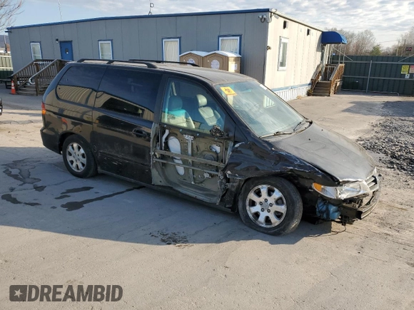 2003 Honda Odyssey EX-L with VIN 5FNRL189X3B114181, listed as a Copart auction lot 54316105 with 103,214 mi miles and Salvage Title. Bid and sale history available at DreamBid. Image 4.
