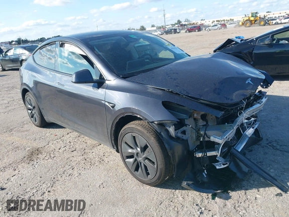 2025 Tesla Model Y Long Range with VIN 7SAYGDED4SF226776, listed as a IAAI auction lot 41514317 with 1,636 mi miles and . Bid and sale history available at DreamBid. Image 1.