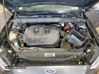 2017 Ford Fusion Titanium z VIN 3FA6P0D93HR303905, wystawiony jako Copart lot #63621745 z przebiegiem 120 249 mil mil oraz Szkoda całkowita • Salvage title. Historia ofert i sprzedaży dostępna na DreamBid. Obrazek 11.