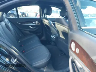 2021 Mercedes-Benz E-Class E 450 with VIN W1KZF5KB8MB002449, listed as a IAAI auction lot 41224307 with 57,093 mi miles. Bid and sale history available at carsss.com. Image 8.