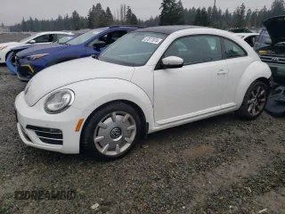 2017 Volkswagen Beetle SE with VIN 3VWJ17AT9HM615963, listed as a Copart auction lot 87077074 with 84,151 mi miles and Salvage Title. Bid and sale history available at DreamBid. Image 1.