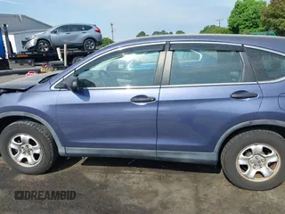 2014 Honda CR-V LX with VIN 3CZRM3H34EG702492, listed as a IAAI auction lot 42096296 with 63,748 mi miles and . Bid and sale history available at carsss.com. Image 14.