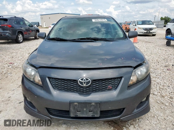 2010 Toyota Corolla z VIN 2T1BU4EE2AC497519, wystawiony jako Copart lot #64614915 z przebiegiem 183 890 mil mil oraz Szkoda całkowita • Salvage title. Historia ofert i sprzedaży dostępna na DreamBid. Obrazek 5.