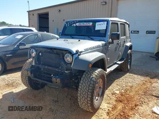 2017 Jeep Wrangler Unlimited Sport z VIN 1C4BJWDG2HL714822, wystawiony jako IAAI lot #41967673 z przebiegiem 95 165 mil mil oraz . Historia ofert i sprzedaży dostępna na DreamBid. Obrazek 2.