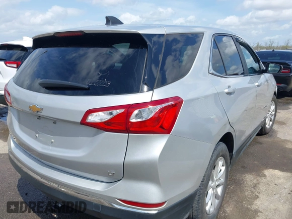 2021 Chevrolet Equinox LT with VIN 2GNAXKEV3M6129404, listed as a IAAI auction lot 41779923 with 113,615 mi miles and . Bid and sale history available at DreamBid. Image 4.