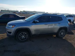 2019 Jeep Compass Altitude with VIN 3C4NJCBB0KT743606, listed as a IAAI auction lot 41468490 with 57,787 mi miles and . Bid and sale history available at DreamBid. Image 14.