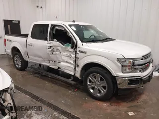 2019 Ford F-150 XL with VIN 1FTEW1E56KKC49604, listed as a IAAI auction lot 41790961 with 105,975 mi miles. Bid and sale history available at carsss.com. Image 1.