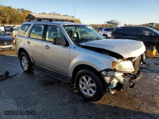 2010 Mazda Tribute Grand Touring with VIN 4F2CY0C74AKM03659, listed as a Copart auction lot 84494254 with 160,177 mi miles and Salvage Title. Bid and sale history available at carsss.com. Image 4.