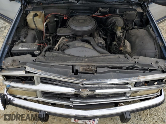 1994 GMC Suburban z VIN 1GKEC16K4RJ762562, wystawiony jako Copart lot #81242184 z przebiegiem 182 583 mil mil oraz Szkoda całkowita • Salvage title. Historia ofert i sprzedaży dostępna na DreamBid. Obrazek 14.