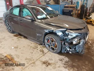 2021 Alfa Romeo Giulia Ti z VIN ZARFANBN9M7641230, wystawiony jako IAAI lot #41542596 z przebiegiem 47 101 mil mil oraz . Historia ofert i sprzedaży dostępna na DreamBid. Obrazek 1.