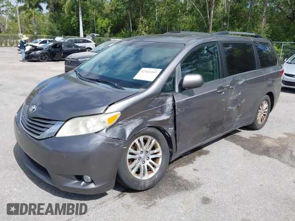 2015 Toyota Sienna XLE with VIN 5TDYK3DC3FS556859, listed as a IAAI auction lot 42161107 with 200,502 mi miles and . Bid and sale history available at DreamBid. Image 17.