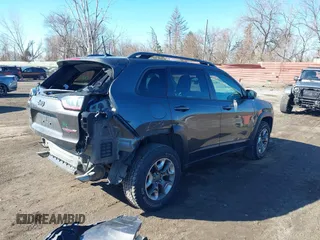 2019 Jeep Cherokee Trailhawk with VIN 1C4PJMBX6KD410391, listed as a IAAI auction lot 41821355 with 79,473 mi miles and . Bid and sale history available at DreamBid. Image 4.