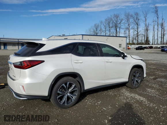 2021 Lexus RX with VIN JTJHZKFA5M2033300, listed as a Copart auction lot 47238435 with 61,452 mi miles and Salvage Title. Bid and sale history available at carsss.com. Image 3.