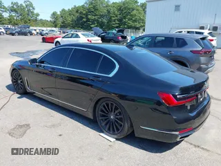 2020 BMW 7 Series 740i xDrive with VIN WBA7T4C03LGF97293, listed as a IAAI auction lot 40189953 with 64,936 mi miles and . Bid and sale history available at DreamBid. Image 3.