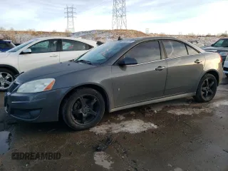 2009 Pontiac G6 1SB with VIN 1G2ZJ57K694245551, listed as a Copart auction lot 84080784 with 189,700 mi miles and Salvage title. Bid and sale history available at DreamBid. Image 1.