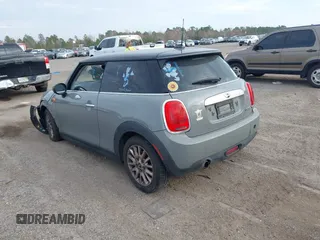 2015 MINI Hardtop with VIN WMWXM5C59F3A58798, listed as a IAAI auction lot 41514988 with 127,771 mi miles and . Bid and sale history available at DreamBid. Image 3.