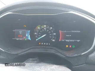 2019 Ford Fusion Hybrid Titanium with VIN 3FA6P0RU4KR144445, listed as a IAAI auction lot 42059840 with 90,617 mi miles. Bid and sale history available at carsss.com. Image 7.