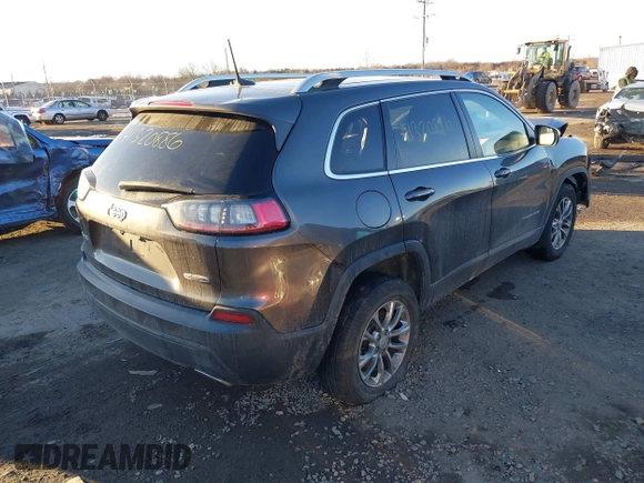 2019 Jeep Cherokee Altitude with VIN 1C4PJMLN0KD213357, listed as a IAAI auction lot 41320886 with 136,506 mi miles. Bid and sale history available at carsss.com. Image 4.