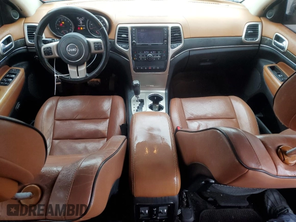 2013 Jeep Grand Cherokee Overland with VIN 1C4RJFCTXDC555233, listed as a Copart auction lot 44535045 with 104,721 mi miles and Clean Title. Bid and sale history available at carsss.com. Image 8.