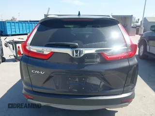 2019 Honda CR-V EX with VIN 5J6RW1H5XKA044056, listed as a IAAI auction lot 41856217 with 92,552 mi miles. Bid and sale history available at carsss.com. Image 17.