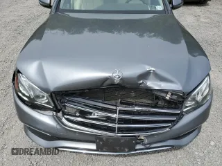 2018 Mercedes-Benz E 300 with VIN WDDZF4KBXJA337966, listed as a Copart auction lot 58718355 with 54,264 mi miles and Salvage title. Bid and sale history available at DreamBid. Image 11.