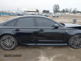 2017 Audi A6 Premium Plus z VIN WAUF2AFCXHN003804, wystawiony jako IAAI lot #41885852 z przebiegiem 59 876 mil mil oraz . Historia ofert i sprzedaży dostępna na DreamBid. Obrazek 14.