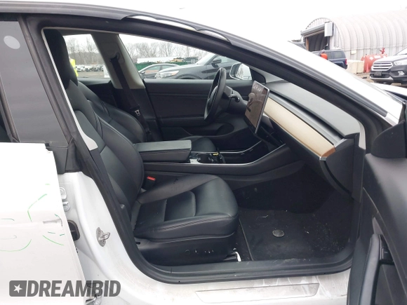 2020 Tesla Model 3 Standard Range Plus with VIN 5YJ3E1EA7LF659172, listed as a IAAI auction lot 42017026 with 32,104 mi miles. Bid and sale history available at carsss.com. Image 5.