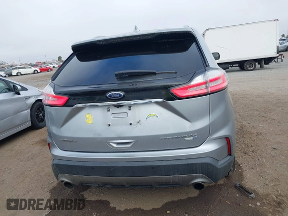 2020 Ford Edge Titanium z VIN 2FMPK4K95LBA16379, wystawiony jako IAAI lot #41190704 z przebiegiem 69 076 mil mil oraz . Historia ofert i sprzedaży dostępna na DreamBid. Obrazek 17.