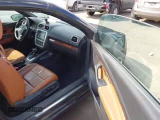 2010 Volkswagen Eos Lux z VIN WVWFA7AH1AV025675, wystawiony jako IAAI lot #42113813 z przebiegiem 93 885 mil mil oraz . Historia ofert i sprzedaży dostępna na DreamBid. Obrazek 5.