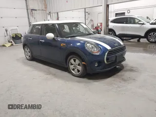 2017 MINI Hardtop 4 Door Cooper with VIN WMWXU1C51H2E18017, listed as a IAAI auction lot 41700947 with 32,306 mi miles and . Bid and sale history available at DreamBid. Image 1.