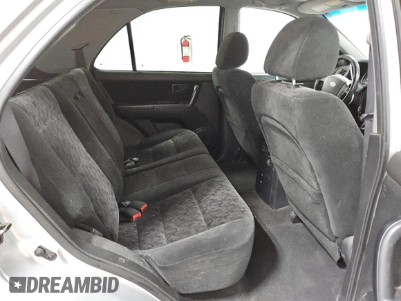 2007 Kia Sorento LX z VIN KNDJD736075700860, wystawiony jako Copart lot #82119114 z przebiegiem 290 641 mil mil oraz Czysty tytuł • Clean title. Historia ofert i sprzedaży dostępna na DreamBid. Obrazek 11.