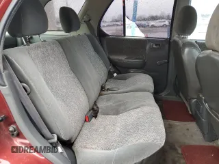 2002 Isuzu Rodeo z VIN 4S2CK58D124323937, wystawiony jako Copart lot #86155194 z przebiegiem 184 491 mil mil oraz Szkoda całkowita • Salvage title. Historia ofert i sprzedaży dostępna na DreamBid. Obrazek 11.