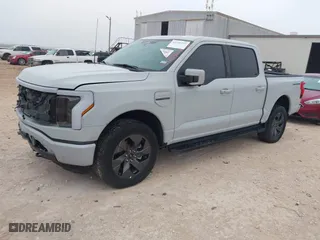 2023 Ford F-150 Lightning Pro with VIN 1FTVW1EL7PWG19070, listed as a IAAI auction lot 41536193 with 22,654 mi miles. Bid and sale history available at carsss.com. Image 2.