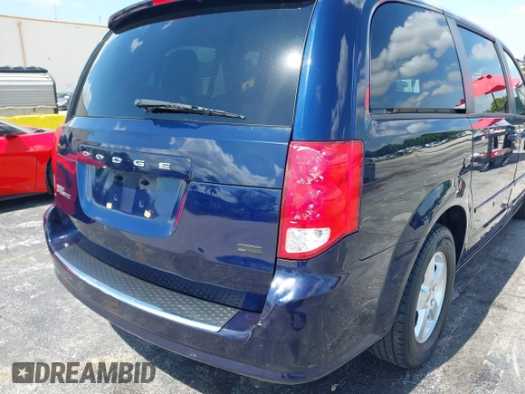 2013 Dodge Grand Caravan SXT with VIN 2C4RDGCG3DR611519, listed as a IAAI auction lot 42237571 with 156,858 mi miles and . Bid and sale history available at DreamBid. Image 6.