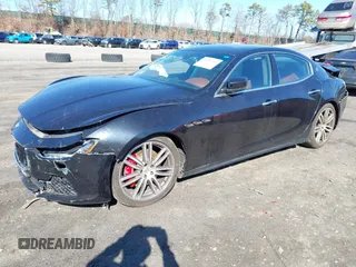 2014 Maserati Ghibli S Q4 z VIN ZAM57RTA9E1089297, wystawiony jako IAAI lot #41687559 z przebiegiem 64 627 mil mil oraz . Historia ofert i sprzedaży dostępna na DreamBid. Obrazek 2.