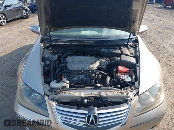 2006 Acura RL z VIN JH4KB16596C005876, wystawiony jako IAAI lot #42666228 z przebiegiem 146 897 mil mil oraz . Historia ofert i sprzedaży dostępna na DreamBid. Obrazek 10.