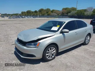 2011 Volkswagen Jetta Sedan SE w/Convenience & Sunroof with VIN 3VWDX7AJ9BM316541, listed as a IAAI auction lot 42037920 with 83,658 mi miles. Bid and sale history available at carsss.com. Image 2.