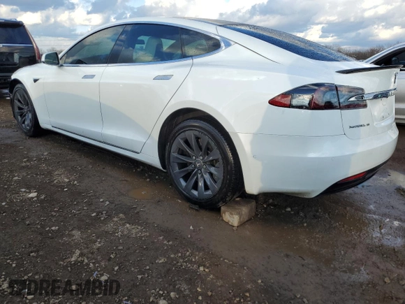 2017 Tesla Model S 100D с VIN 5YJSA1E26HF212985, выставлен на аукционе Copart как лот 46702705 с пробегом 58 179 миль миль и Списание • Salvage title. История ставок и продаж доступна на DreamBid. Изображение 2.