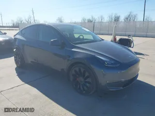 2022 Tesla Model Y Performance with VIN 7SAYGDEFXNF516963, listed as a IAAI auction lot 41765138 with 11,761 mi miles. Bid and sale history available at carsss.com. Image 1.
