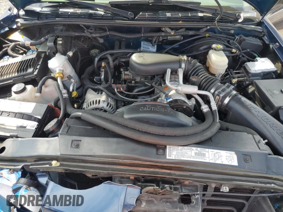2000 Chevrolet Blazer LS with VIN 1GNCT18W3YK104430, listed as a Copart auction lot 68858864 with 47,342 mi miles and Salvage title. Bid and sale history available at DreamBid. Image 12.