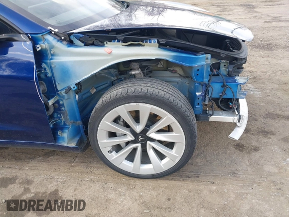 2022 Tesla Model 3 with VIN 5YJ3E1EA7NF188417, listed as a IAAI auction lot 41885623 with 105,457 mi miles and . Bid and sale history available at DreamBid. Image 19.